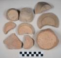 Coarse red bodied earthenware base sherds, unslipped; two sherds crossmend