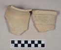 Coarse buff bodied earthenware rim sherds, with buff slip