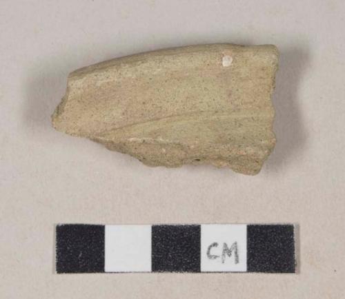 Coarse green bodied earthenware rim sherd, unslipped