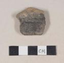 Coarse red bodied earthenware rim sherd, unslipped, blackened on one side