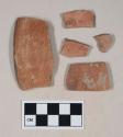 Red bodied earthenware rim sherds, with red slip and black slipped stripes, wheel thrown