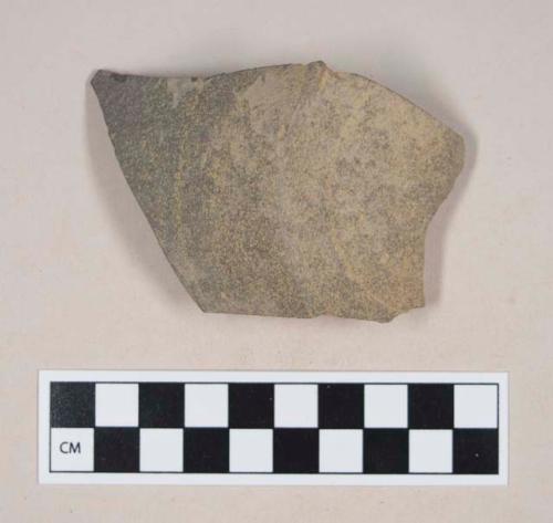 Gray bodied earthenware base sherd, with gray slip, wheel thrown