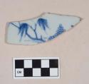 Blue hand painted porcelain tile fragment