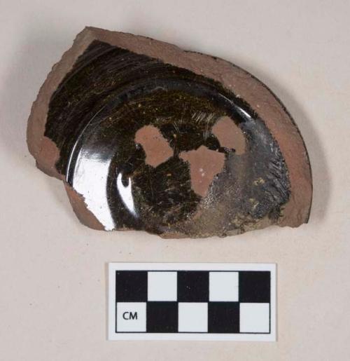 Undecorated, lead glazed redware base sherd