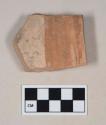 Red bodied earthenware rim sherd, with partial red slip, wheel thrown