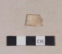 Unidentified refined earthenware body sherd, missing all glaze