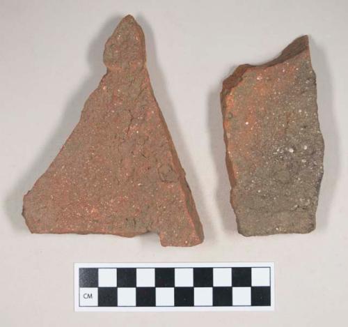 Redware roof tile fragments, one with nail hole