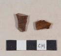 Ceramic, earthenware, agateware body sherds; two sherds crossmend