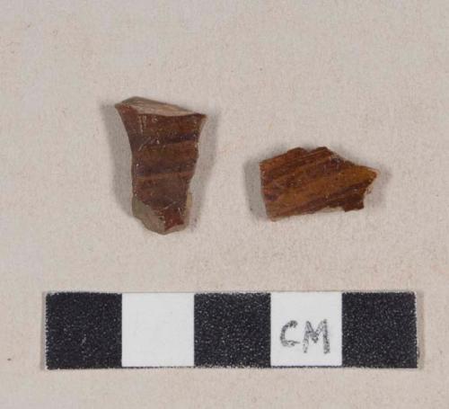 Ceramic, earthenware, agateware body sherds; two sherds crossmend