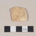 Tin glaze earthenware body sherd, missing all glaze