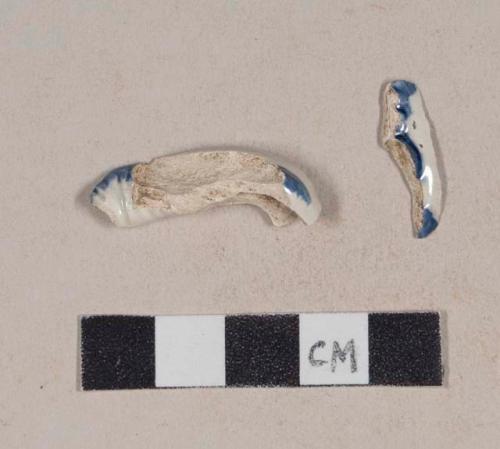 Blue shell decorated pearlware handle sherds; two sherds crossmend