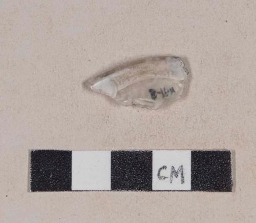 Folded colorless glass rim fragment