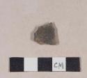 Burned, lead glazed redware body sherd