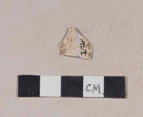 Blue transfer printed whiteware rim sherd