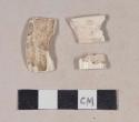 Molded creamware handle sherds; two sherds crossmend