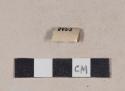 Buff-bodied, buff glazed stoneware body sherd