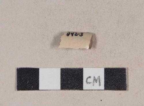 Buff-bodied, buff glazed stoneware body sherd