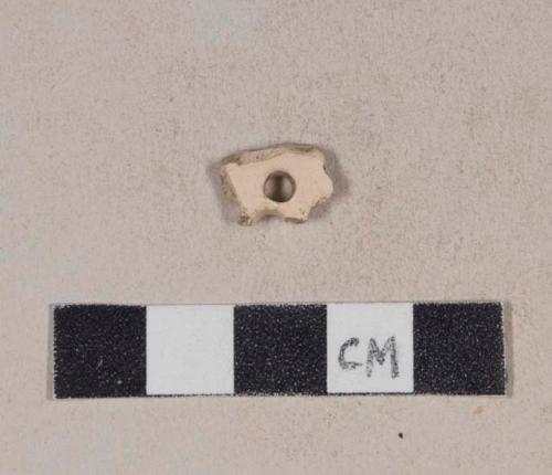 Buff salt glazed stoneware body sherd, with pierced holes