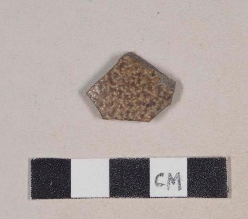 Brown salt glazed, gray bodied stoneware body sherd