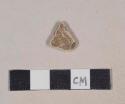 Tin glaze earthenware body sherd, missing all glaze