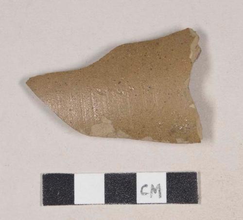 Buff-bodied, brown salt glazed stoneware body sherd; crossmends with 987-22-10/109939