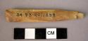 Base fragment of bone implement - possibly a chisel