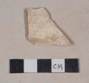 Unglazed, undecorated refined earthenware body sherd