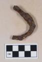Curved iron bar fragment
