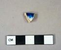 Ceramic, earthenware, pearlware, blue and white shell edge, rim fragment