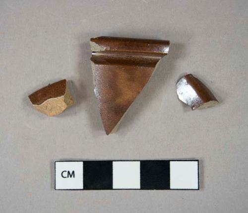 Ceramic, stoneware, two sherds Nottingham type; one sherd orange-bodied brown salt glaze