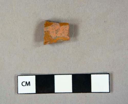 Ceramic, earthenware, redware, brown lead glaze, body sherd