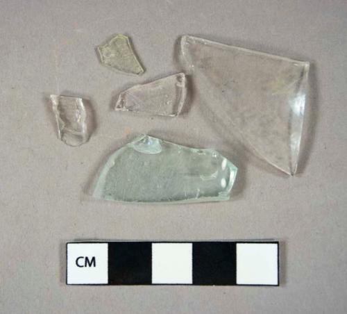 Glass, curved, 9 clear, 2 aqua, and 1 green fragment