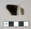 Glass, curved, olive green fragments