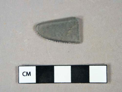 Synthetic, plastic, knife fragment