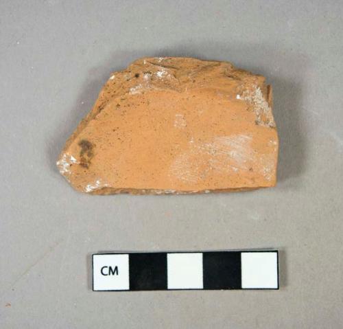 Ceramic, earthenware, redware, unglazed, base sherd