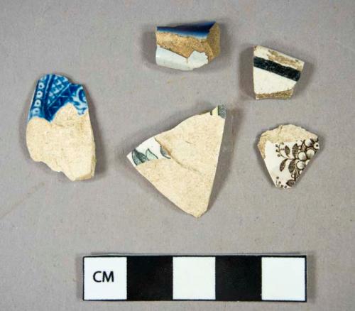 Ceramic, coarse and refined earthenware, blue tin glaze body sherd, blue transferprint pearlware rim sherd, brown banded whiteware rim sherd, black transferprint whiteware body sherd, polychrome transferprint body sherd