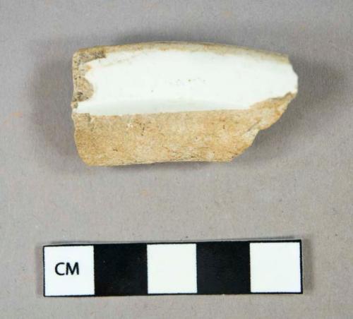 Ceramic, refined earthenware, whiteware rim sherd