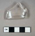 Glass, colorless vessel fragment