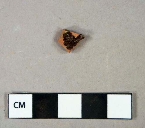 Ceramic, earthenware, brown glazed redware body sherd