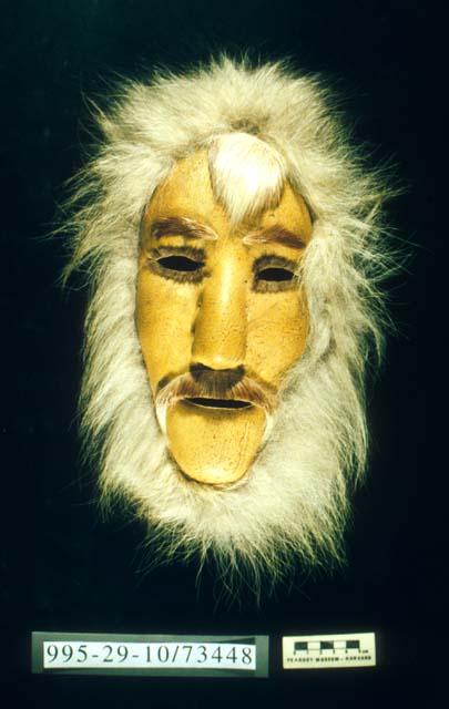 Leather mask of caribou skin and wolf fur