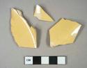 Ceramic, refined earthenware, yellowware base fragments