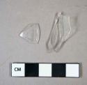 Glass, colorless bottle base and shoulder fragments