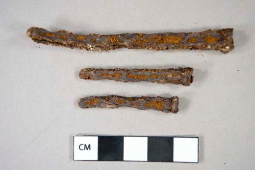 Ferrous metal, nail fragments, including cut nails