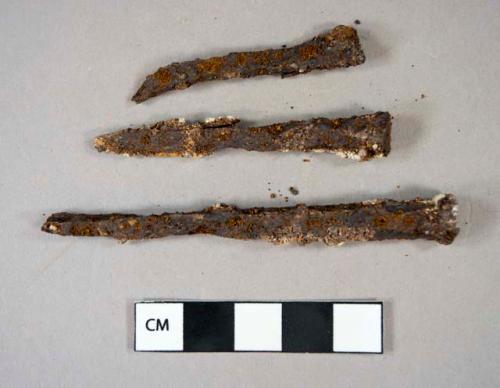 Ferrous metal, nail fragments, including cut nails
