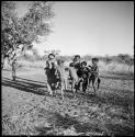 Children playing N≠a N≠a Hau / N!hau-N!hau (the basket game)