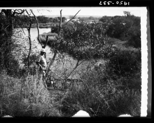 C. J. Mathias standing next to Popa Falls