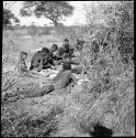 Group of men working and talking together