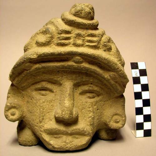 Animal shaped vase, human head (stone)