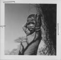 Boy holding his hands behind his head, portrait