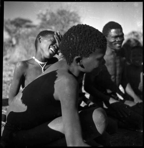 Group of boys playing !ó'm!hú / !’Om g!xuni / ’Ai kota !U!u g!xuni / N!aih //’an (the porcupine game, also known as the axe game, assegai game or war game)